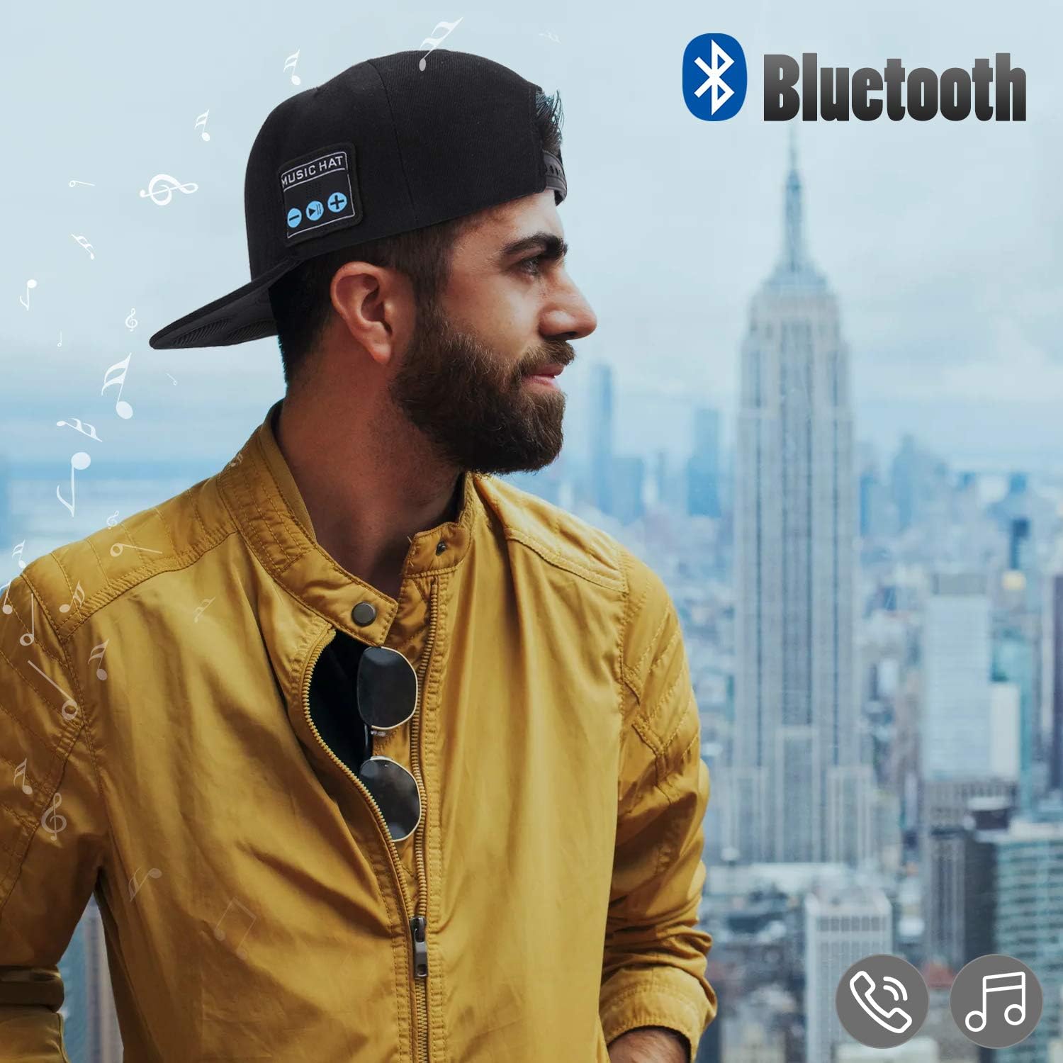 Man wearing a Bluetooth speaker cap against a city skyline, showcasing the Bluetooth technology for music on the go.